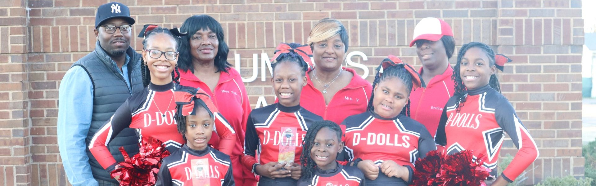 Cheer dance team group photo with coaches