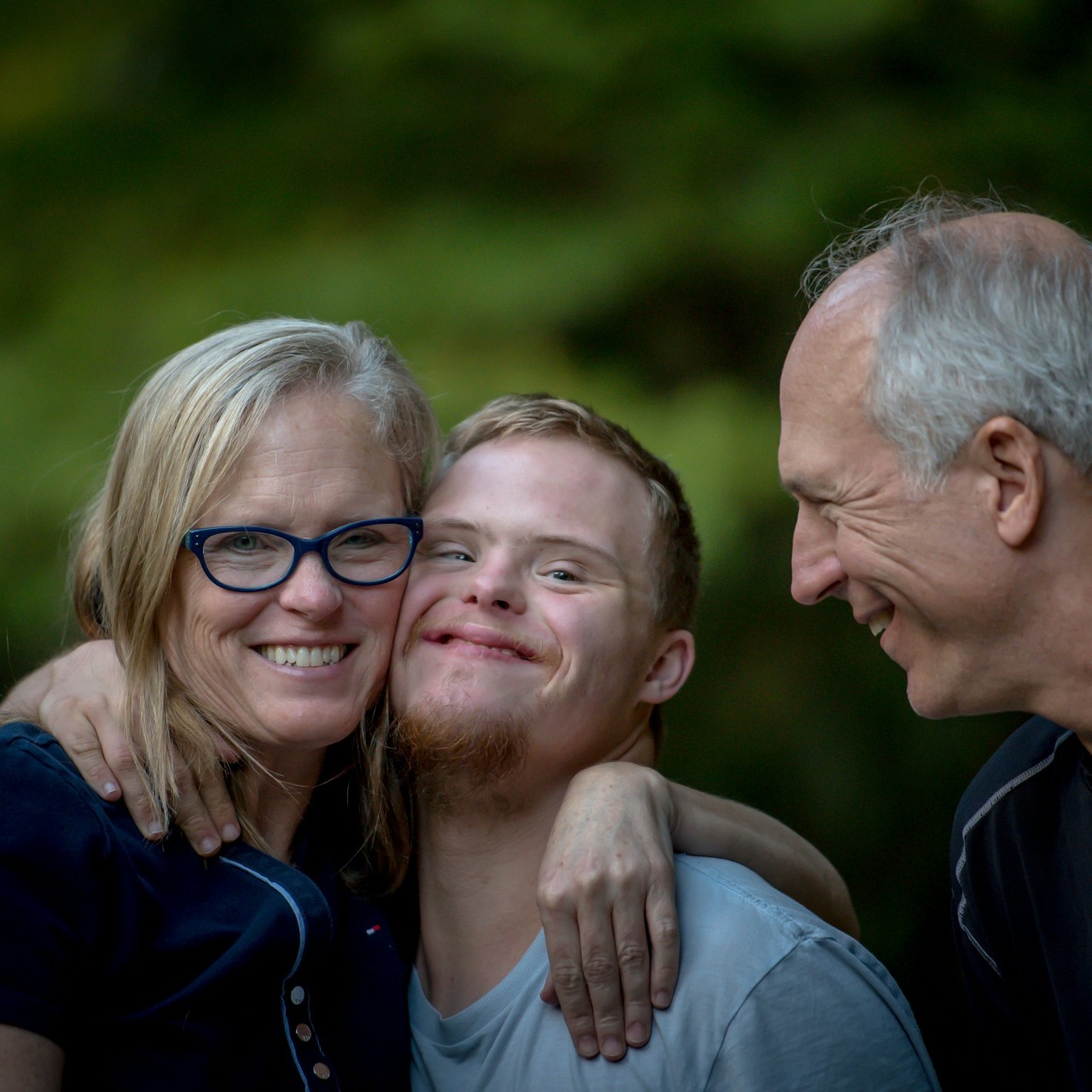 Small picture of a family hugging