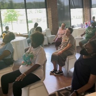 Residents viewing presentation